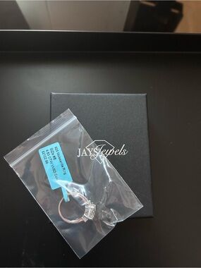 Size 8 moissanite ring in silver